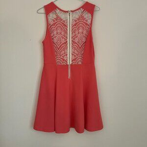 coral and white dress with lace back